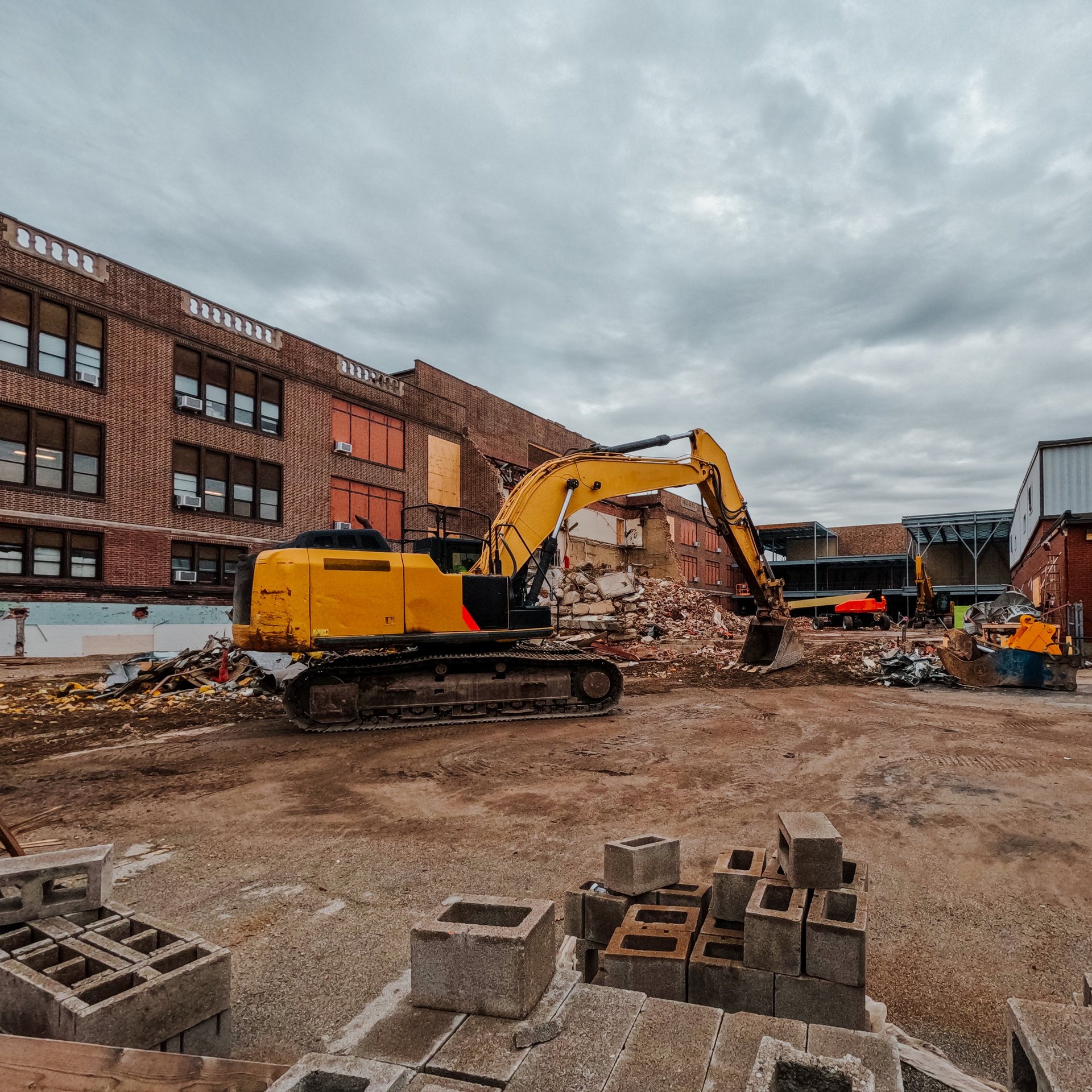 Construction and demolition site with heavy equipment